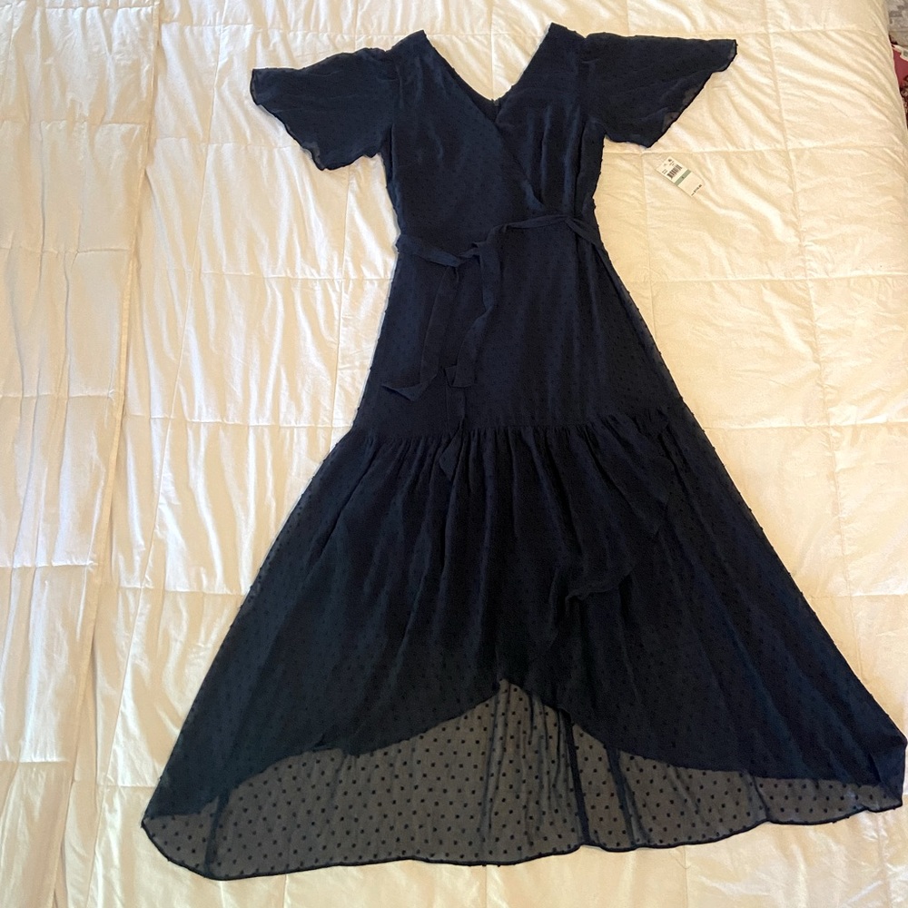 Navy blue chiffon, high low, midi dress with flutter sleeves and removable belt.